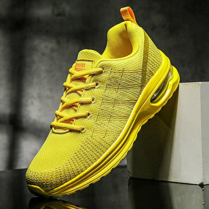 Stevvex men's breathable lightweight sneakers with yellow knit upper and air cushion outsole on Tampa Home & Garden Store