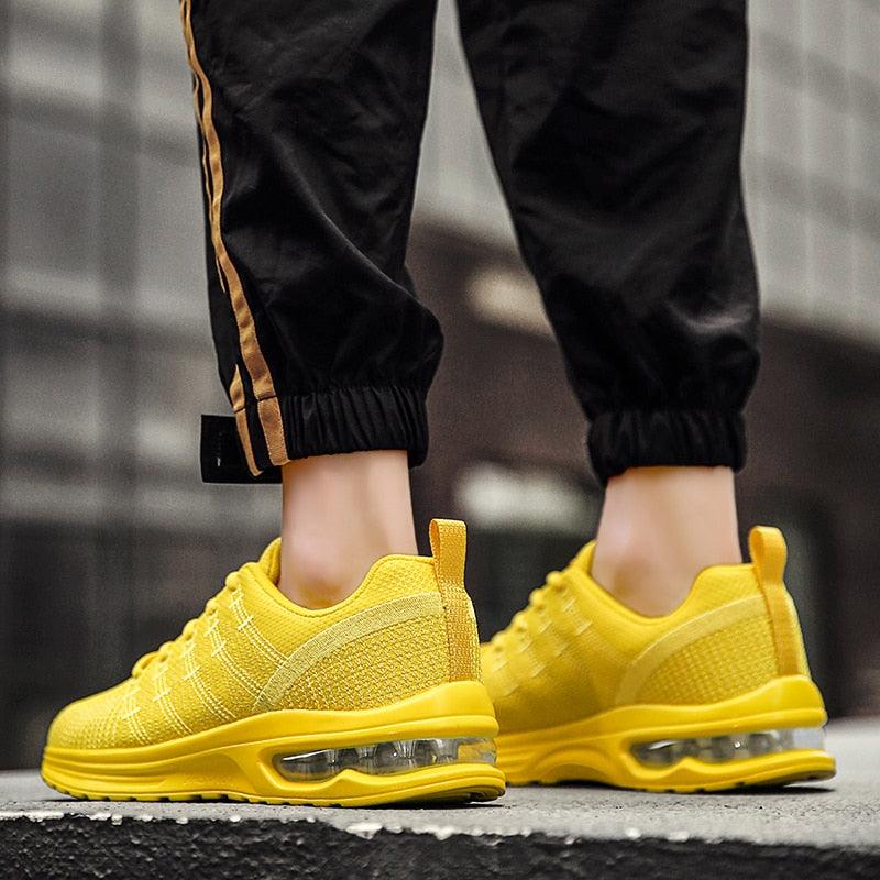 Stevvex men's yellow breathable running sneakers pair with knit upper and air-cushion sole on Tampa Home & Garden Store