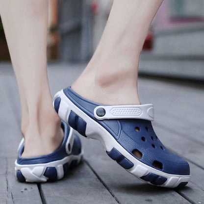 Stevvex men's blue and white slip-on clogs with ventilation holes and adjustable strap on Tampa Home & Garden Store