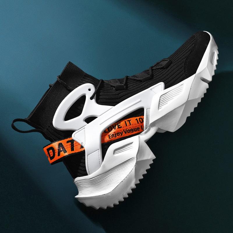 Mens high top mesh sneakers with black upper and white chunky sole orange strap detail on Tampa Home & Garden Store