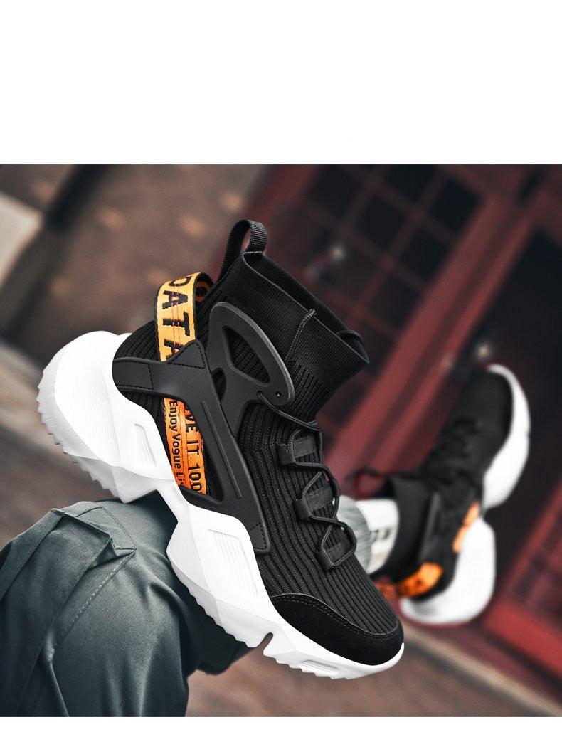 Stevvex men's high-top sneakers, black knit mesh with white chunky sole and orange pull-tab, 2 sneakers on Tampa Home & Garden Store
