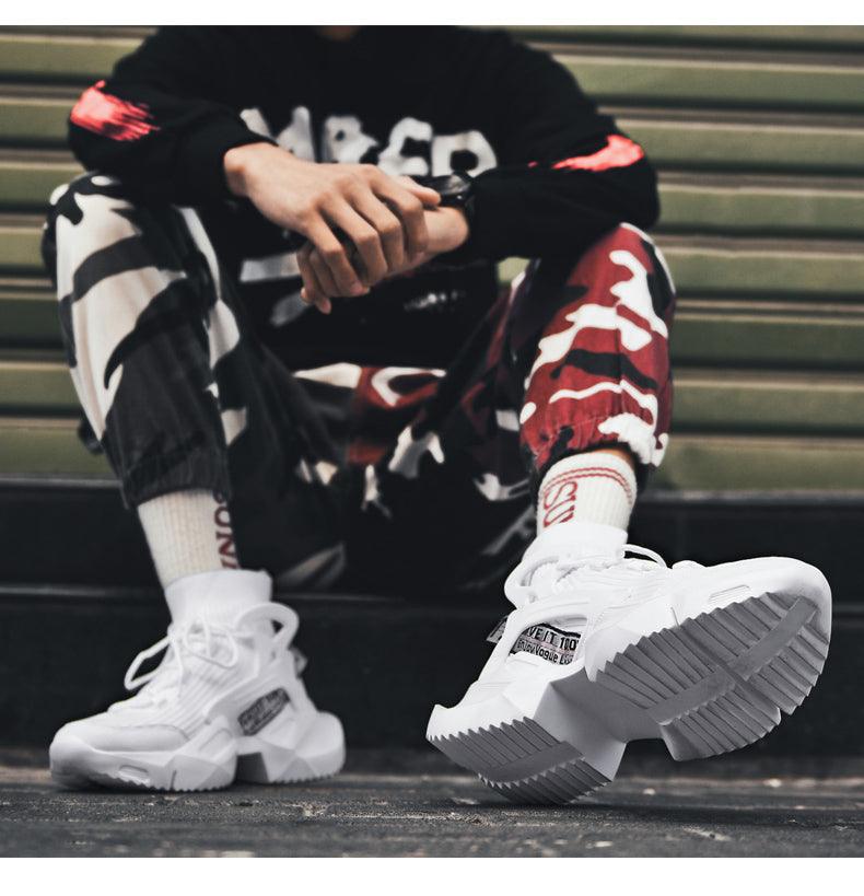 Pair of white Stevvex high-top mesh sneakers with chunky sole on Tampa Home & Garden Store