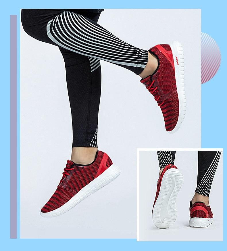 Mens athletic running sneakers with red knit upper and white flexible sole Stevvex pair on Tampa Home & Garden Store