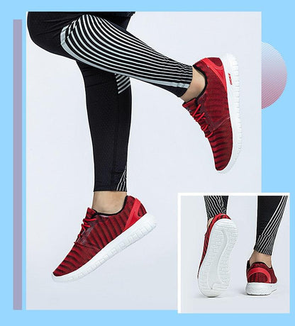 Mens athletic running sneakers with red knit upper and white flexible sole Stevvex pair on Tampa Home & Garden Store
