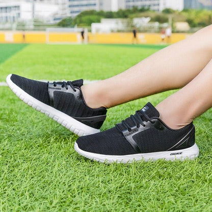 Pair of men's lightweight running sneakers black mesh Stevvex athletic shoes on Tampa Home & Garden Store