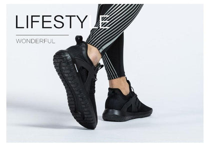 Stevvex mens black running sneakers pair with breathable knit upper and flexible sole on Tampa Home & Garden Store