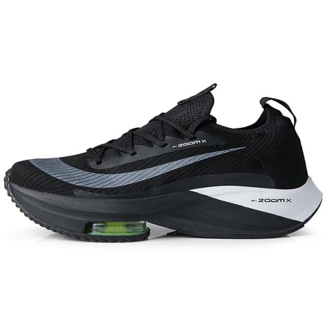 Stevvex Mens running air cushion sneakers with black mesh upper and green air unit on sole on Tampa Home & Garden Store