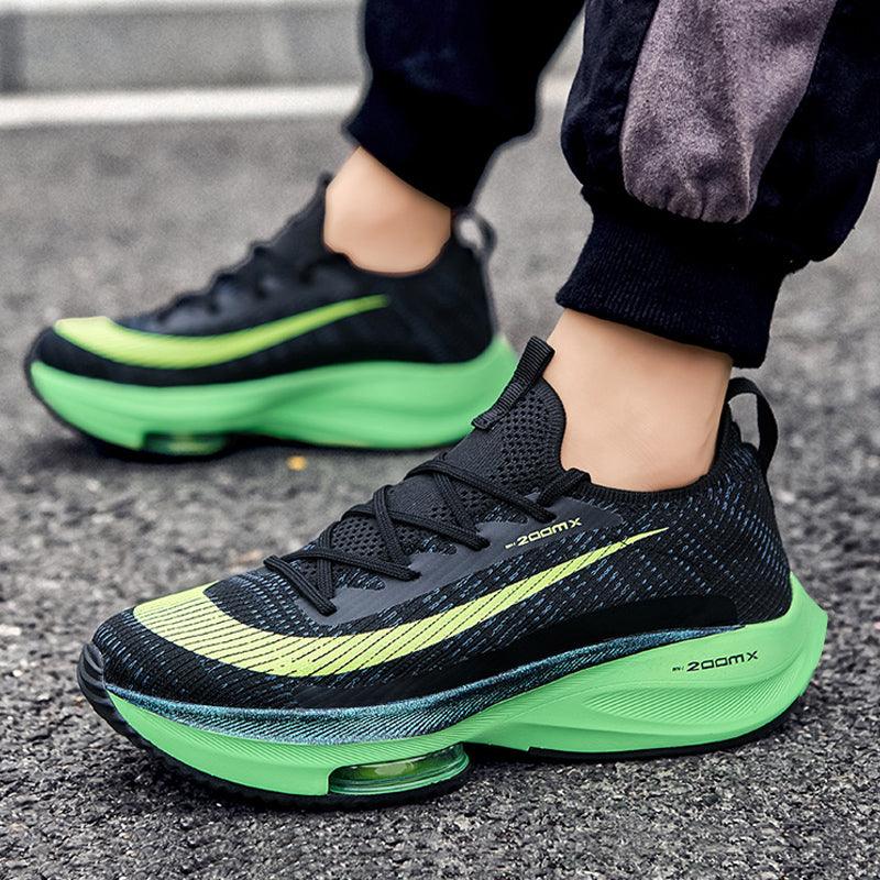 Stevvex men's running sneakers pair, black knit upper with neon green air cushion sole on Tampa Home & Garden Store