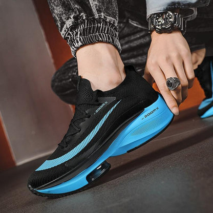 Stevvex men's running sneakers with breathable black knit upper and blue air-cushioned sole on Tampa Home & Garden Store