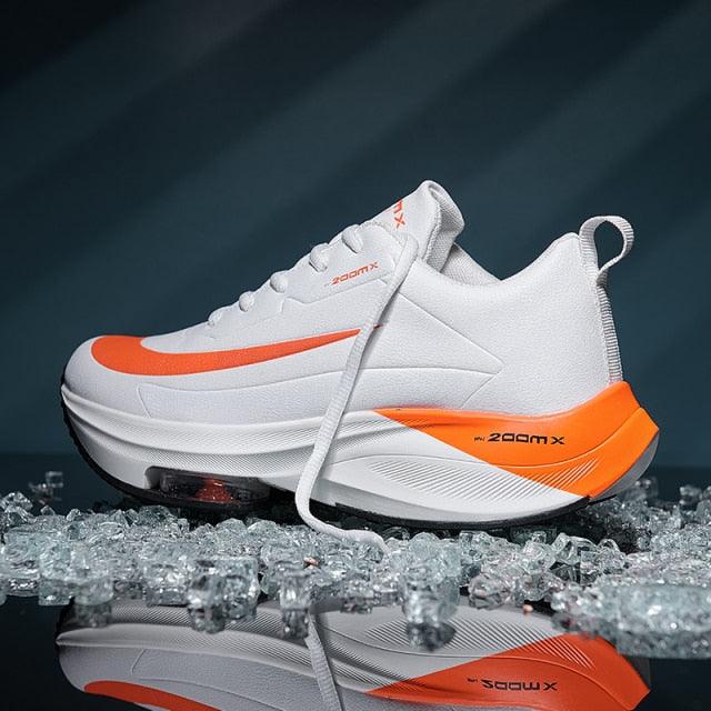 Stevvex men's running sneakers white with orange accents, lightweight breathable air cushion on Tampa Home & Garden Store