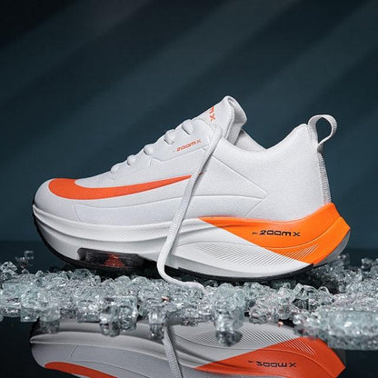 Stevvex men's running sneakers white with orange accents, lightweight breathable air cushion on Tampa Home & Garden Store