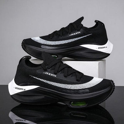 Stevvex men's running sneakers black with white midsole and green air cushion pair on Tampa Home & Garden Store