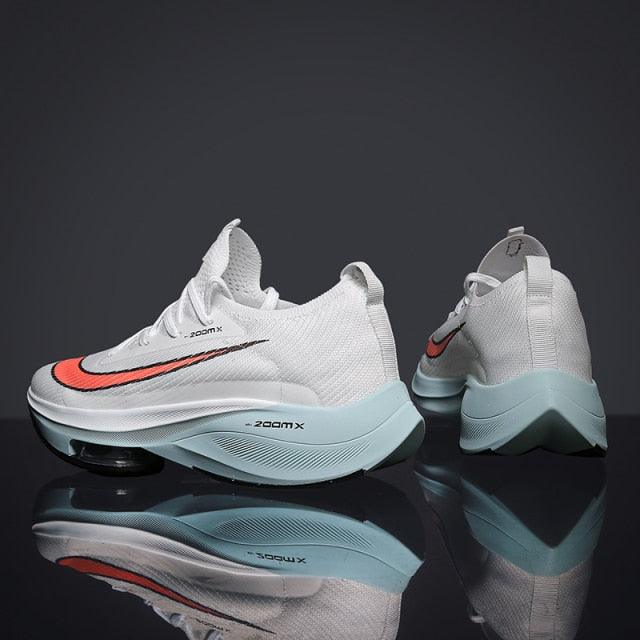 Stevvex men's running sneakers pair white mesh orange accent light blue air cushion sole on Tampa Home & Garden Store