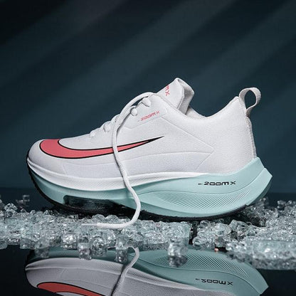Stevvex men's running sneakers white breathable trainer with pink accent swoosh and mint sole on Tampa Home & Garden Store