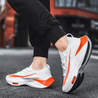 Stevvex men's running sneakers ST85SH8523ENR white orange accents breathable air cushion on Tampa Home & Garden Store