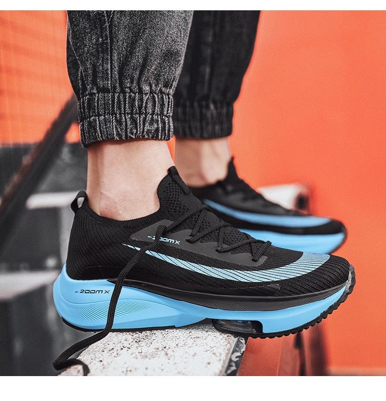 Stevvex men's running sneakers pair with black knit upper and blue cushioned midsole on Tampa Home & Garden Store