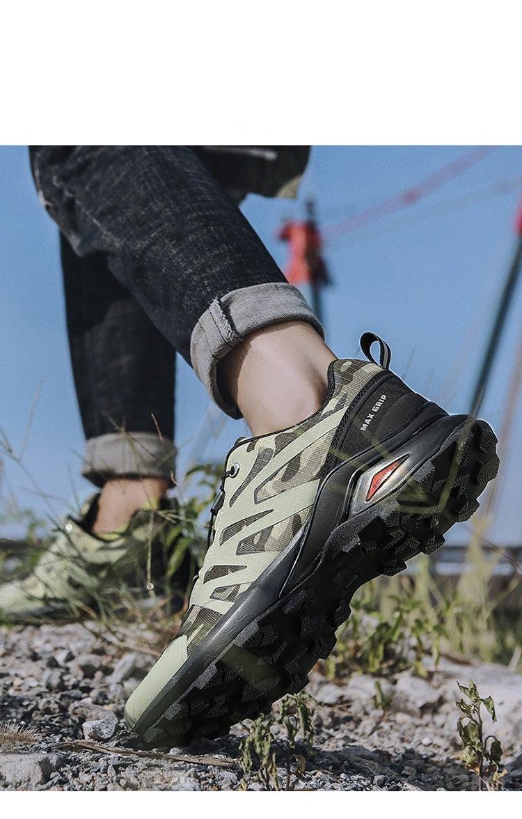 Mens Stevvex camo hiking shoe with breathable upper and lug outsole on rocky terrain on Tampa Home & Garden Store