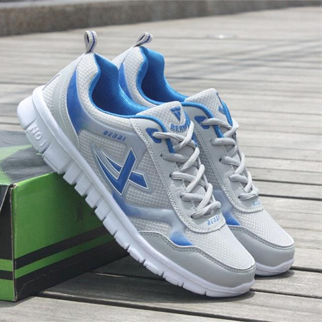 Men's sport running sneakers Stevvex pair, white mesh with blue accents, lightweight shoes on Tampa Home & Garden Store