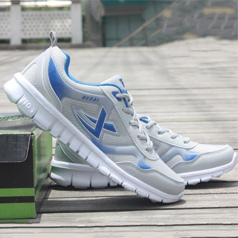 Mens running sneakers Stevvex in white and blue breathable mesh lightweight shoes pair on Tampa Home & Garden Store