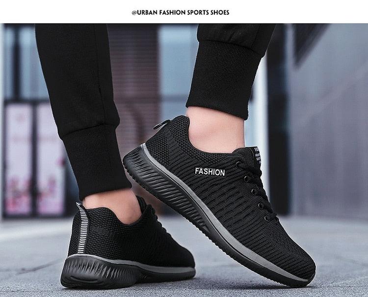 Mens black mesh running sneakers with breathable mesh, gray sole, lace-up on Tampa Home & Garden Store