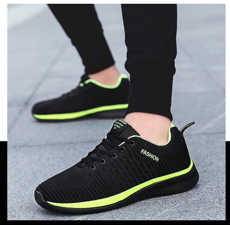 Stevvex men's black mesh running sneakers with neon green sole trim pair on Tampa Home & Garden Store
