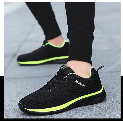 Stevvex men's black mesh running sneakers with neon green sole trim pair on Tampa Home & Garden Store