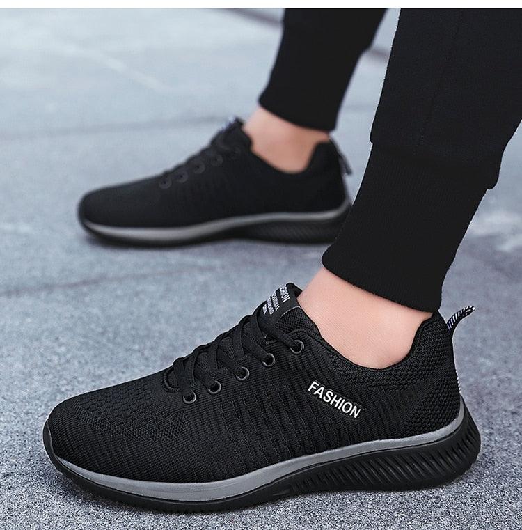 Stevvex Mens running sneakers black mesh breathable casual shoes with lace-up grey sole on Tampa Home & Garden Store