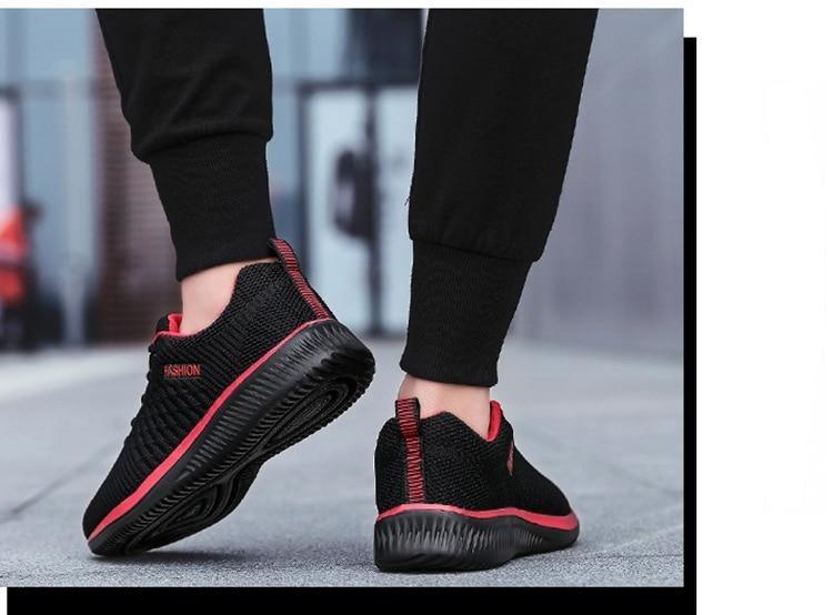 Stevvex men's running sneakers pair, black mesh with red trim, breathable walking sneakers on Tampa Home & Garden Store