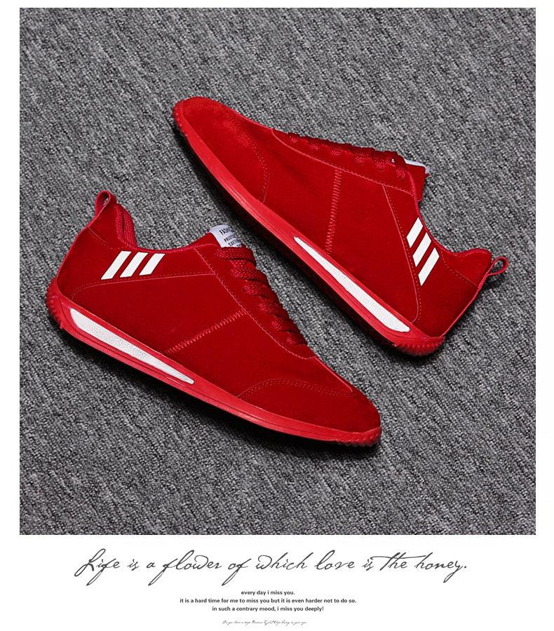 Red low-top ST85SH8222GOB sneakers with white stripe accents, two casual running shoes on Tampa Home & Garden Store