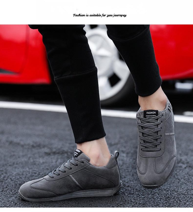 Stevvex men's grey lace-up sneakers, low-cut casual athletic footwear, two shoes shown on Tampa Home & Garden Store