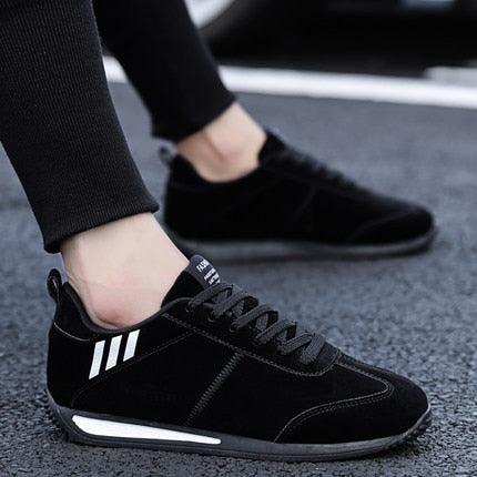 Stevvex black sneakers with white side stripes, lightweight casual athletic footwear on Tampa Home & Garden Store