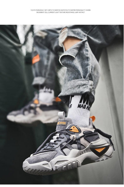 Stevvex men's chunky sneakers with grey upper, orange accents and thick sole on Tampa Home & Garden Store