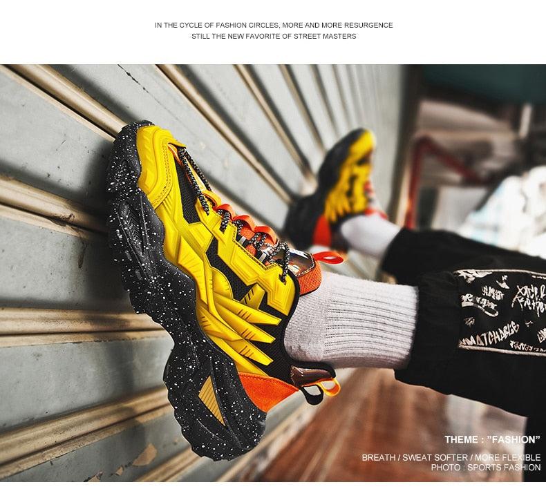 Stevvex mens chunky high-top sneakers with bright yellow/orange panels and thick speckled sole on Tampa Home & Garden Store