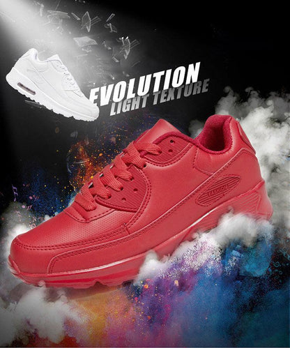 Red lace-up sneakers with white pair in background, mesh outdoor sport shoes with chunky sole on Tampa Home & Garden Store