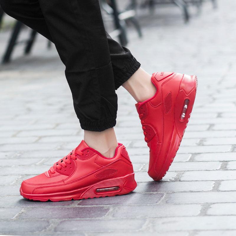 Sneakers Stevvex red lace-up athletic shoes with visible air and chunky sole on cobblestone on Tampa Home & Garden Store