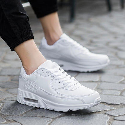 Stevvex white unisex lace-up athletic sneakers with air-cushion sole on Tampa Home & Garden Store