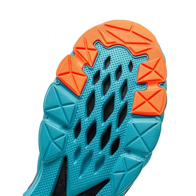 Stevvex athletic shoes outsole in teal blue with orange traction pods for running on Tampa Home & Garden Store