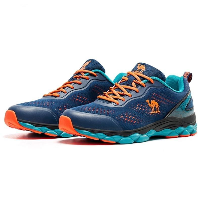 Stevvex breathable navy athletic running shoes pair with orange laces and turquoise outsole on Tampa Home & Garden Store