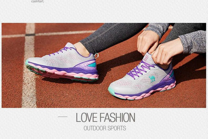 Stevvex athletic sneakers pair in grey with purple laces and pink-teal outsole on track on Tampa Home & Garden Store