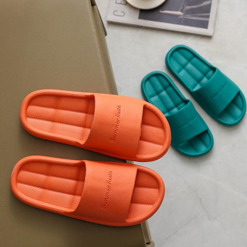 Non-slip bathroom slippers; orange and teal flip flops with quilted footbeds, two pairs on Tampa Home & Garden Store