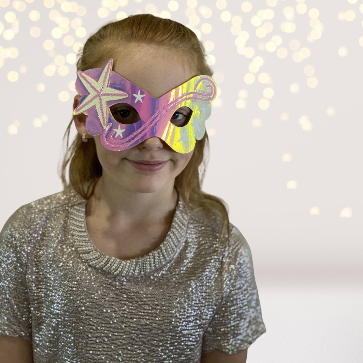Mermaid Teepee Tent Gift Set mask worn by girl in iridescent pink mask with glitter backdrop on Tampa Home & Garden Store