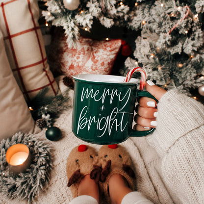 Merry & Bright coffee mug by Gia Roma, green ceramic with white script, candy cane on handle on Tampa Home & Garden Store