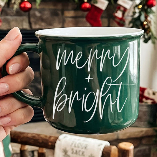 Merry & Bright Gia Roma coffee mug, green ceramic with white script on Tampa Home & Garden Store
