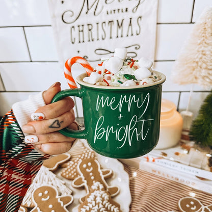 Merry & Bright green ceramic coffee mug by Gia Roma topped with marshmallows, sprinkles and a candy cane on Tampa Home & Garden Store