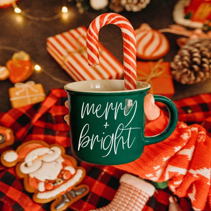 Gia Roma Merry & Bright coffee mug, green ceramic with white script, candy cane accent on Tampa Home & Garden Store
