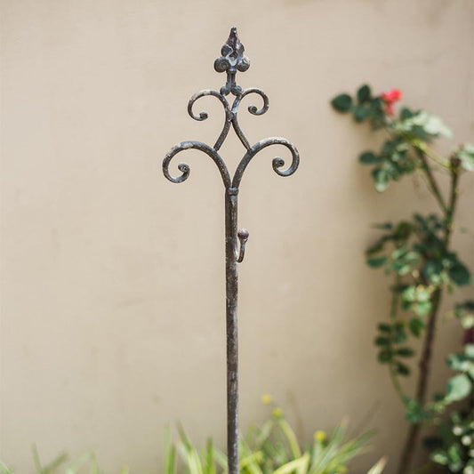 Metal hanging plant stand with hook, adjustable height by RusticReach, decorative scrolls on Tampa Home & Garden Store