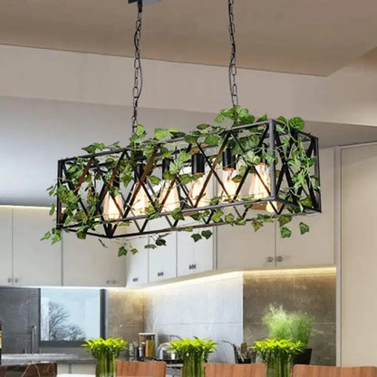 Industrial black metal island pendant with ivy for kitchen lighting hanging from chains on Tampa Home & Garden Store