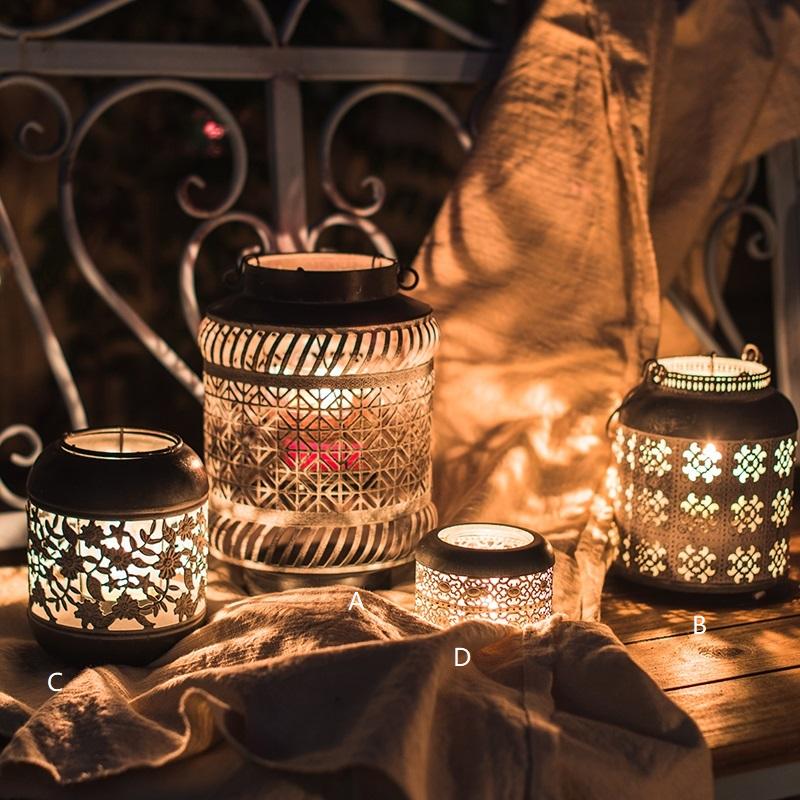 Metal Lantern Candle Holder set by RusticReach; four dark metal lanterns with cutouts on Tampa Home & Garden Store