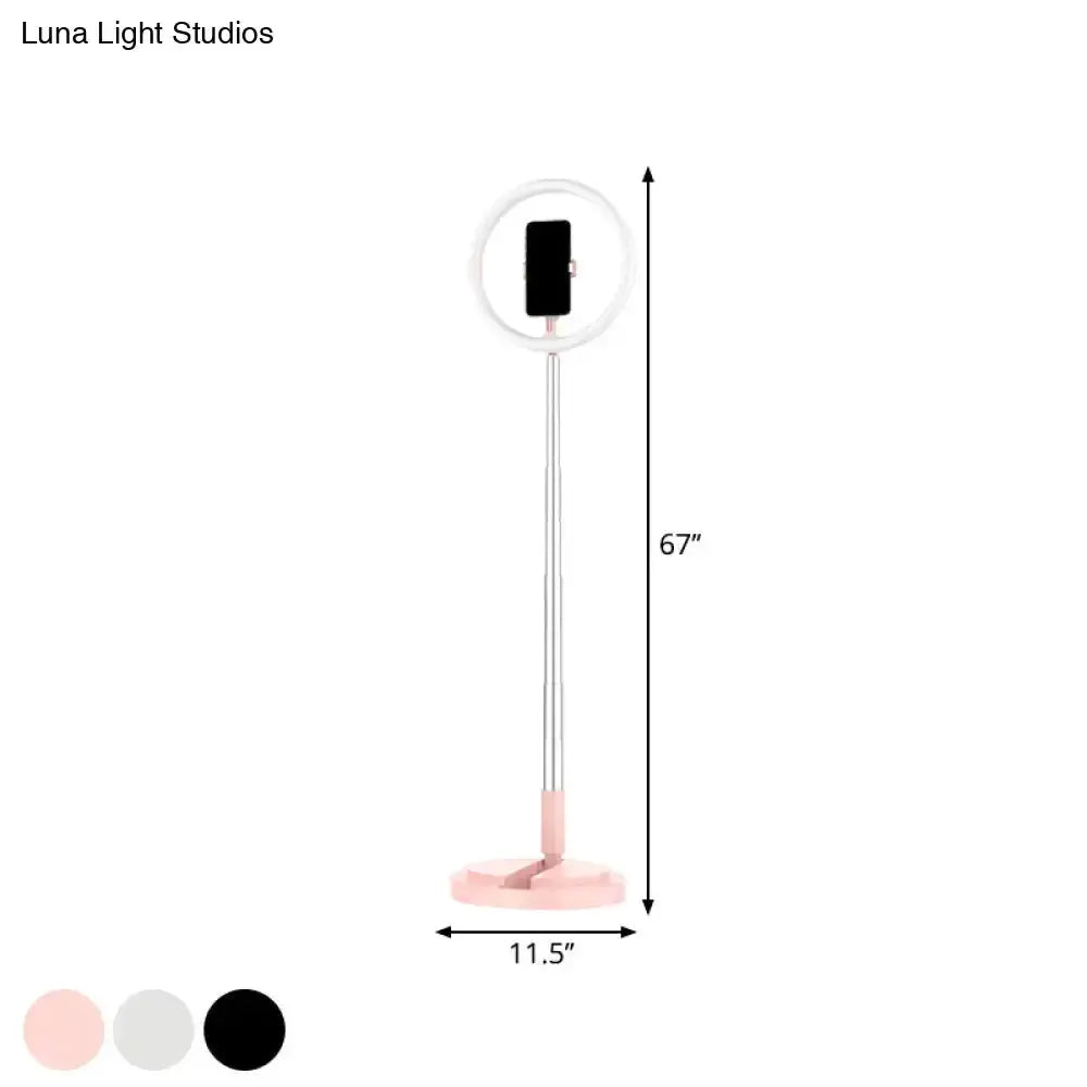 Makeup lamp with LED ring light and phone holder on a tall silver stand with pink base on Tampa Home & Garden Store