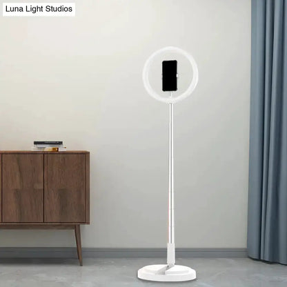 White LED makeup ring light with phone holder on adjustable stand in bedroom setup on Tampa Home & Garden Store